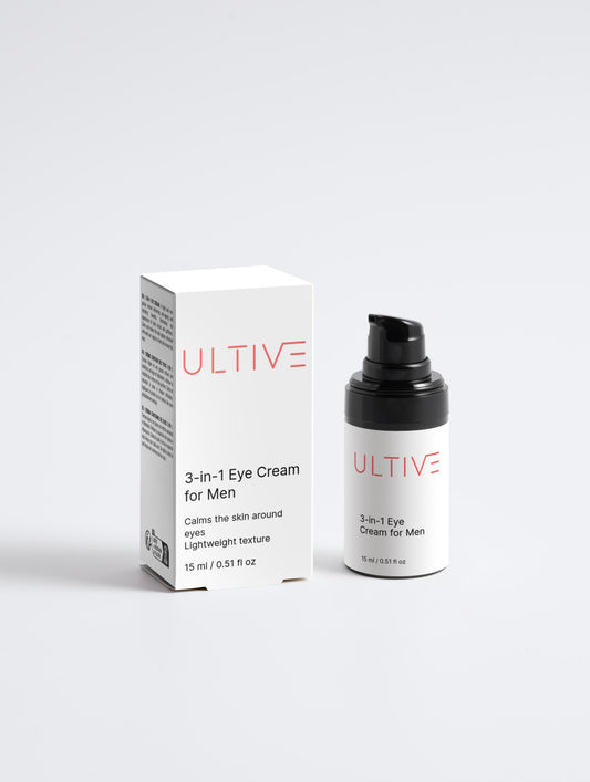 Close-up of Ultive 3-in-1 Eye Cream for Men bottle with sleek black packaging

Man applying Ultive 3-in-1 Eye Cream to reduce puffiness and dark circles

Ultive eye cream on bathroom counter with minimalist grooming essentials